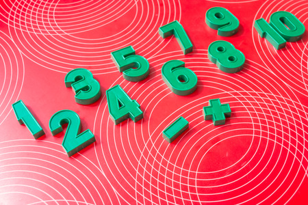 Set of numbers at school, equipment for education. tools for learning. green numbers on a red background. Education and learning concept. new school year. back to schoolの写真素材