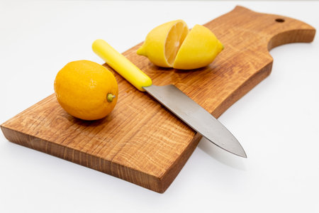 Sliced fresh lemon over chopping board.environmentally friendly, ecological products.prevention of...