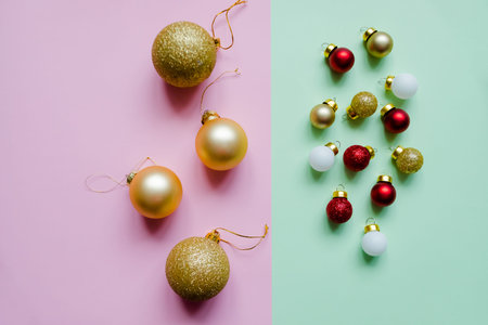 Christmas composition. Christmas balls, golden decorations on pastel background. Flat lay, top view,...
