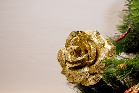 Christmas background. Christmas decoration.Rose Christmas balls.preparing for the holiday. big Golden flowers.festively decorated home interior with New year tree.beautiful ornaments and sparkling lights.の写真素材
