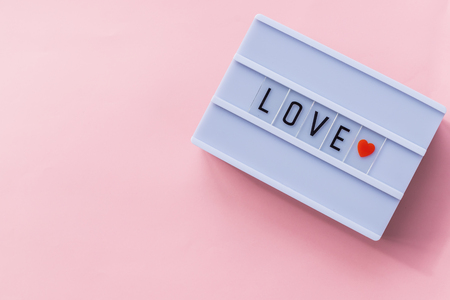 I love coffee text in a light box. Box isolated over white background. A sign with a messageの写真素材