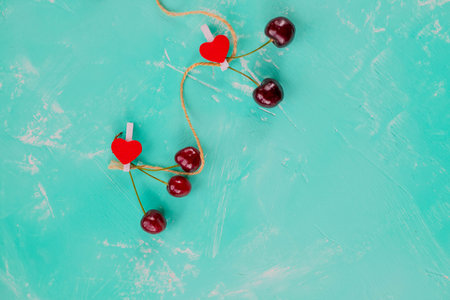 A variety of summer berries in the shape of heart as a symbol of valentine and love.の写真素材