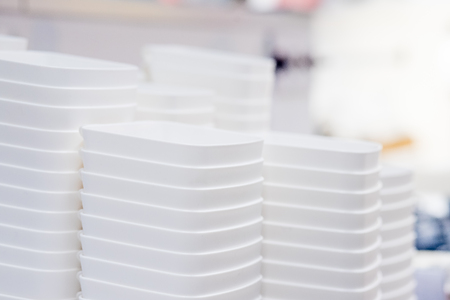 folded white transparent plastic container.stack of plastic containers, boxes.Say no to plastice text and plastice package. Concept of eco pollution.Selective focusの写真素材