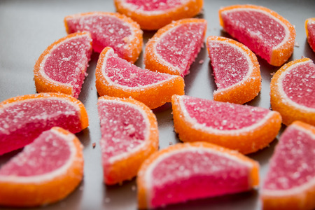 Sweet jelly coated with sugar. Sweet colorful jelly marshmallow coated with sugarの写真素材