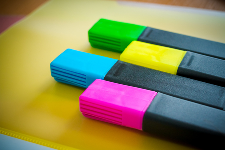 School supplies on green background. Pens, pencils, scissors, ruler, paper clips, notebook and marker on the table. copy space.colorful marker. Markers set. Office table. Back to school. Marker pen. Back to schoolの写真素材