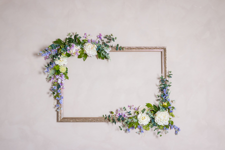 Mock-up for presentation of images, text or other your work. White background with tea, blue kettle and flower in a metal pot. White background with frames, mug and flower in a turquoise pot.の写真素材