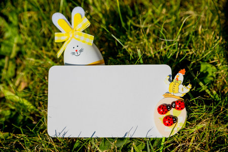Bunny shaped easter eggs.Happy Easter pattern. Stylish easter eggs on meadow background. Modern...