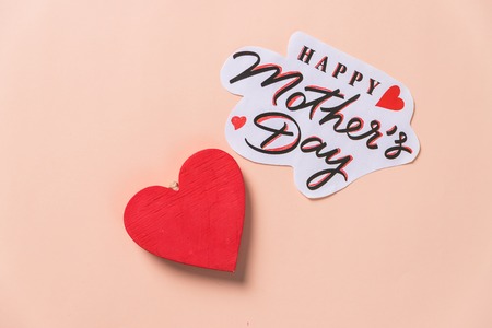 Happy Mothers Day message with handmade small paper heartsの写真素材
