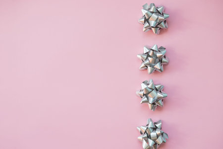 Gift wrapping. Modern Christmas gifts presents.Object for wrapping present boxes.Set of silver bows...