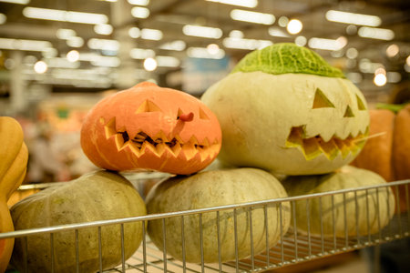 Autumn market in town. Trick or treat.Halloween pumpkin collection for sale at store. Halloween is...