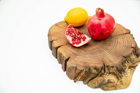 Group of various fruit consists half of tangerine, lemon. fresh fruit on wooden table, isolated wooden plank with space for copy, vitamin c from fruit. Healthy food, diet concept.の写真素材