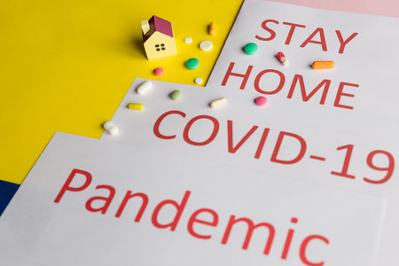 Coronavirus Pandemic Protection Concept. Words stay at home. Minimal concept. Stay safe, concept of...