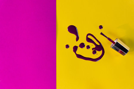 Nail colors ,enamel, mixed multicolor samples, isolated on colorful background.Spilled bright nail...
