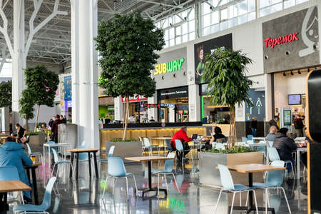Moscow, RUSSIA -october 5,2020: Food court at a shopping center Ikea. People at shopping mall .entertainment complex. There are a lot of cafes and restaurants in shopping malls and department storesのeditorial素材