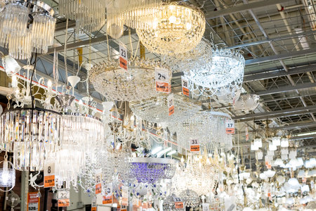 02 december,2020. Omsk, Russia. crystal strass lamp white over blurred background, luxury interior design.Luxurious Crystal chandelier Lamp on the Ceiling, Elegant Vintage Style Decoration.のeditorial素材