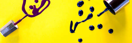 Blots of purple, blue nail polish isolated on bright background.Nail Polish Splashes. art set. Blots of mixed multicolor samples.paint splash isolated on yellow. Web banner.copy spaceの写真素材