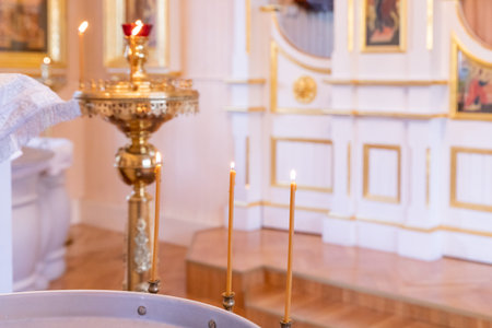 christening bath and the altar at the orthodox church during christening.baptismal font. Accessories...