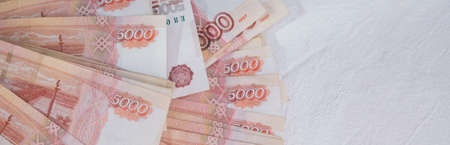 Russian money background. Russian roubles, russian rubles cash closeup. Rubles in cash. Finance and business background. 5000 rubles. Gas crisis concept.web bannerの写真素材