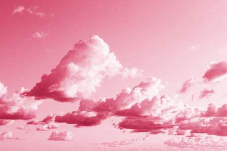 Trendy color of the year 2023. Sky with rain clouds toned in viva magenta color.sky abstract...