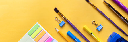 Frame from school and office supplies Paper clips, scissors, pens, felt-tip pens, sharpener,...