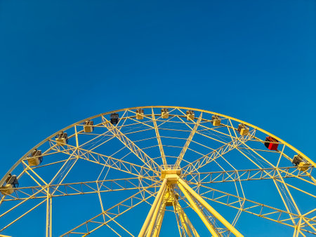 Ferris wheel in an amusement park in Thailandの写真素材