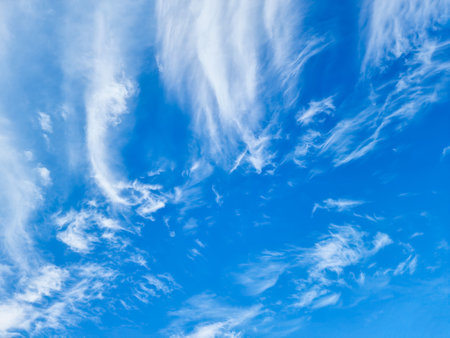 Beautiful Cirrus clouds with blue sky, The Cirrus clouds with clear blue sky background in midday.clear day clouds and nice weather for the summer poster.meteorology and weather forecast concepts.の写真素材