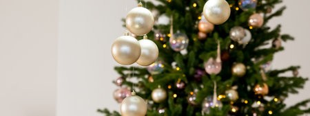 Christmas, New Year, Winter border. Fir tree branches with golden balls and garland. Christmas holiday. mockup. Web banner of winter holidays.の写真素材