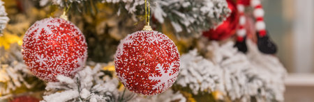 Banner with Christmas tree ornament. Merry Christmas,red baubles on festive background. Winter holidays. web banner formatの写真素材