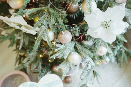 Calm image of interior luxury home living room decorated christmas tree and gifts, sofa covered with blanket.Beautiful New Years decor. home decorationの写真素材