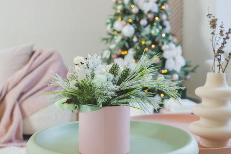 Calm image of interior luxury home living room decorated christmas tree and gifts, sofa covered with blanket.Beautiful New Years decor. home decorationの写真素材