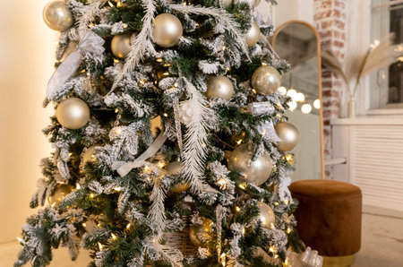 New Year room design. shiny Christmas tree. Winter holidays surprise,luxury Interior. Decor. New Years decor. White snow-covered christmas tree with gifts for new yearの写真素材