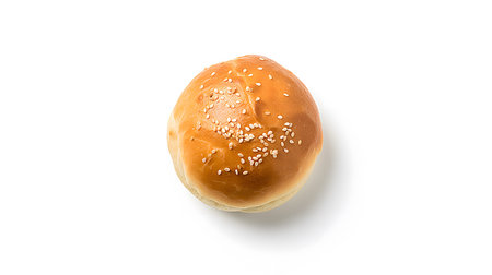 Bun with sesame seeds isolated on white background. Top view.