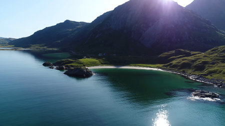 Beautiful Fishing village Undredal against mountain near the Flam in Norway, drone shot