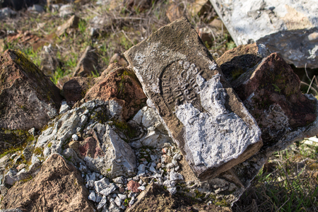 Brick on the pile of rubbish, partly dirty from cement. Still visible production year.の写真素材