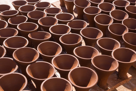 Same ceramic products, stil raw, getting dry on the sun outdoors at the yard of the production....