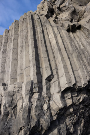 Detail of a mountain with a cave, located on a beach. Fascinating structure of the stone....