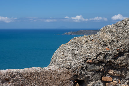 Details of the architecture of well preserved historical building of a Milazzo Castle (Castello di Milazzo), built on a hill with view on the Tyrhennian (Mediterranean) sea. Milazzo, Sicily, Italy.の写真素材