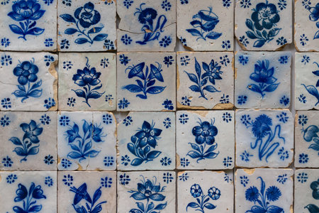 Traditional ceramic tiles on the wall, with  floral motive. White base, blue painting. Funchal, Madeira, Portugal.の写真素材
