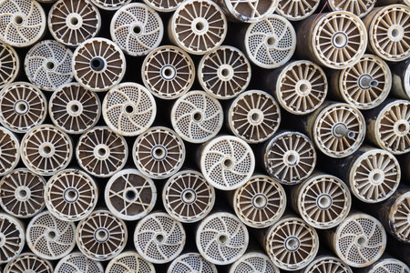 Used water filters stored in an order, creating a pattern with various details. Las Palmas, Gran Canaria, Canary Islands, Spain.の写真素材