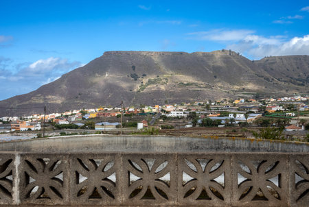 Volcanic mountains in the north-west part of the island. Blue sky with white clouds. Santa cruz, Tenerife, Canary Islands, Spain.の写真素材
