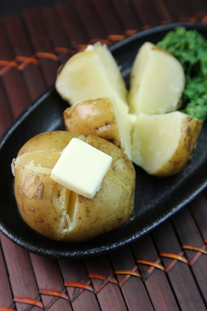 Potato with butterの写真素材