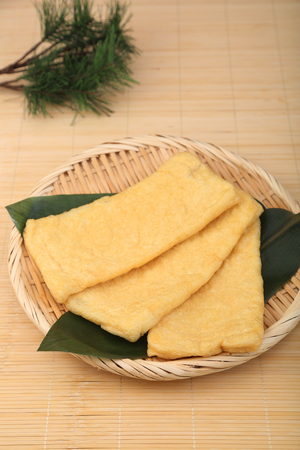 a food made by frying sliced bean curdの写真素材