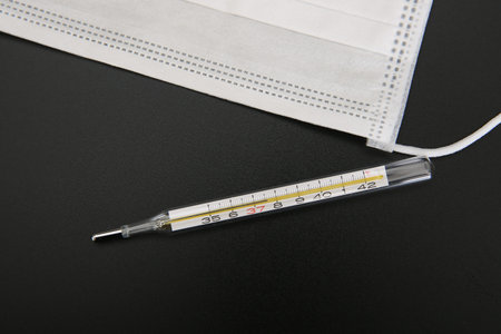 Disposable mask and mercury thermometer