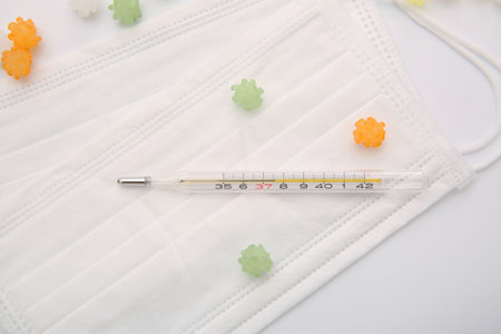 Disposable mask and mercury thermometer