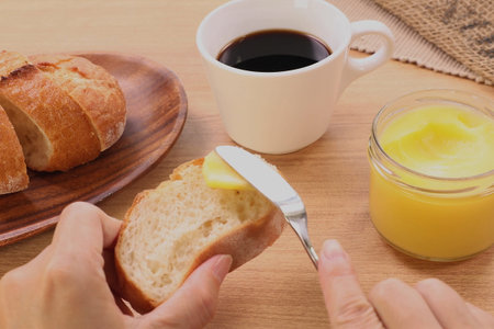 The baguette that I spread butter