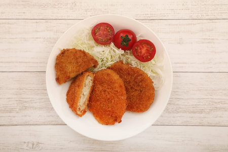 Freshly Fried Croquettes
 with salad on white wooden background, top viewの写真素材