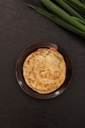 Scallion pancake popular in Taiwanese food stallsの写真素材