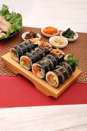 Kimbap is a Korean-style nori roll, which is rolled with rice mixed with sesame oil, salt, and other...