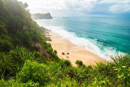 view from hill side of Tropical Hidden Beachの写真素材