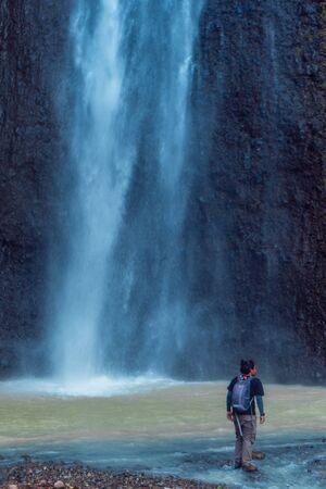 Sidoharjo Waterfall Located in Middle of Forest in Menoreh Highland, Indonesiaの写真素材